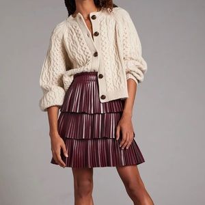 Anthropologie pleated tiered vegan leather skirt.